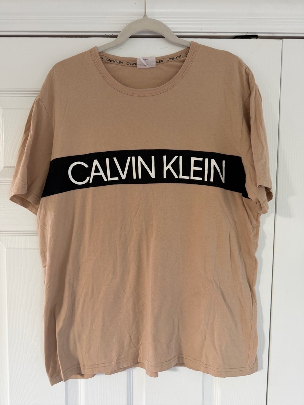 Calvin Klein Beige Short‑Sleeve Tee with Black Logo Band